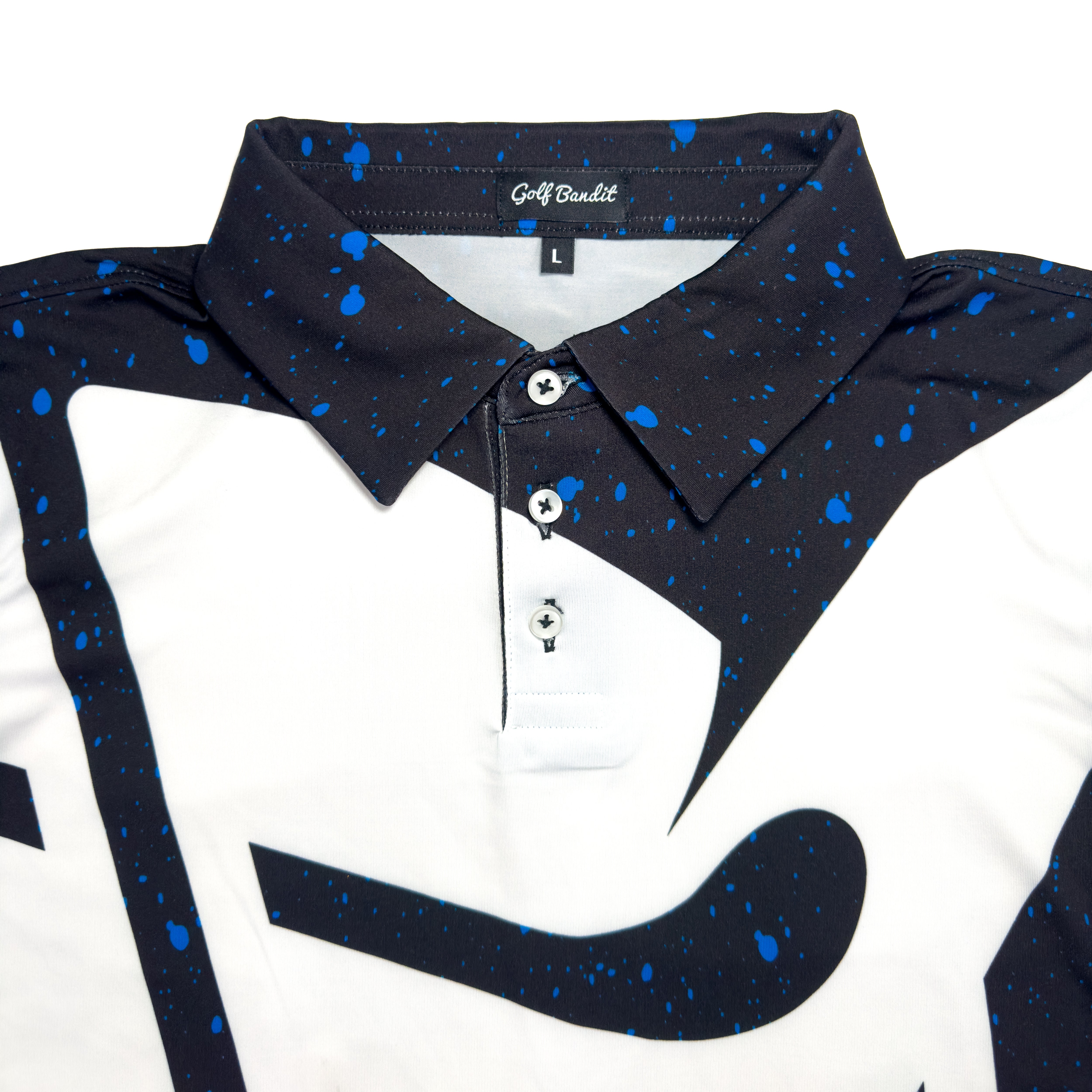 Close-up of Bandito Blitz Boys Junior Golf Polo in bold black and white graphic design with blue speckles, showcasing moisture-wicking fabric, SPF 50 protection, wrinkle-resistance, and 4-way stretch. Perfect junior golf clothing for boys aged 8-14. Golf Bandit Junior Golf Polos are the best quality in US Kids Golf apparel.