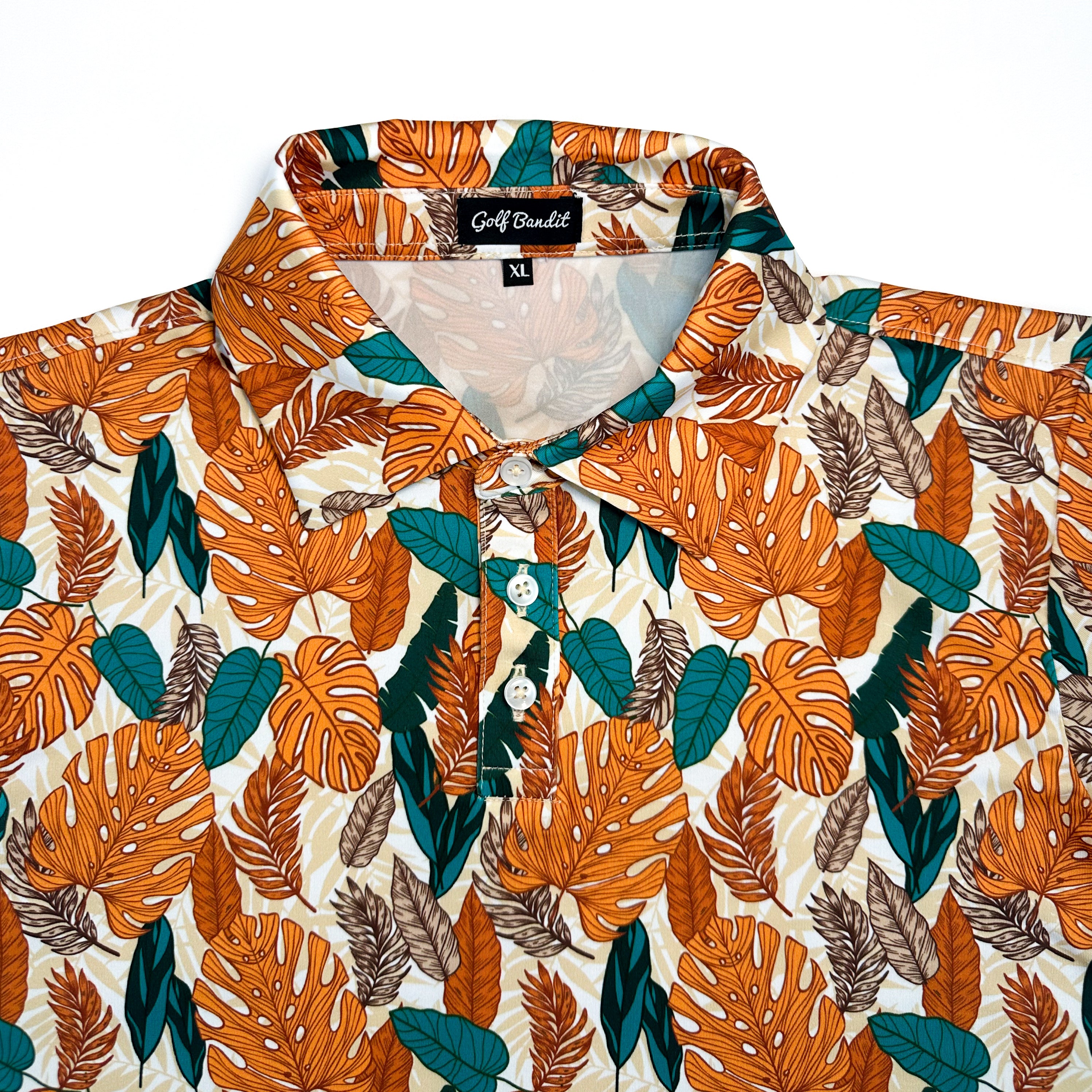 Close-up of Paradise Greens Girls Junior Golf Polo collar in a vibrant leafy design, showcasing moisture-wicking fabric, SPF 50 protection, wrinkle-resistance, and 4-way stretch. Perfect junior golf clothing for girls aged 8-14. Golf Bandit Junior Golf Polos are the best quality in US Kids Golf apparel.